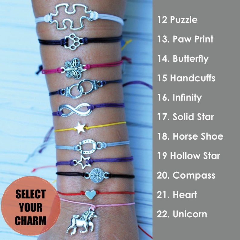 May include: A selection of charm bracelets with various silver-toned pendants, including a puzzle piece, paw print, butterfly, and infinity symbol. Each bracelet features a different colored cord, with the text "SELECT YOUR CHARM" in a circular graphic.