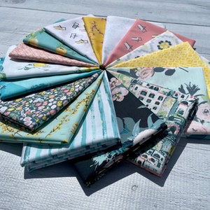 May include: A collection of 15 fabric squares in various patterns and colors, including yellow, blue, green, pink, and white. The fabrics feature floral designs, geometric patterns, and abstract prints.