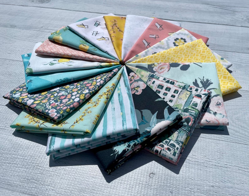 May include: A collection of 15 fabric squares in various patterns and colors, including yellow, blue, green, pink, and white. The fabrics feature floral designs, geometric patterns, and abstract prints.