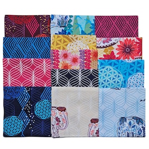 May include: A selection of patterned fabric squares in a variety of colours. Designs include geometric shapes, floral patterns, and elephant illustrations. The colour scheme features blues, pinks, reds, yellows, and white.