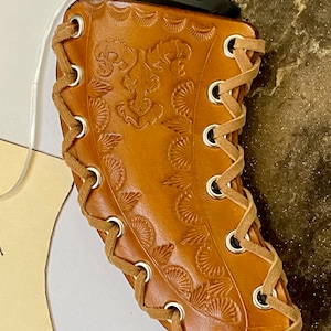Leather Sheath for Karambit Style Knife.  The Tribal is a BIGHORN exclusive original design.