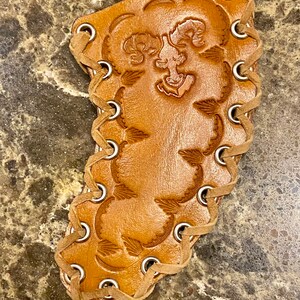 Leather Sheath for Karambit Style Knife.  The Tribal is a BIGHORN exclusive original design.