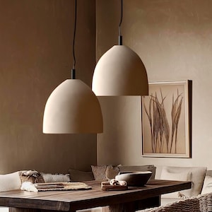 Naaya Dome terracotta ceramic pendant light dining room living room side table moody warm ambient kitchen island handmade clay Naaya Studio