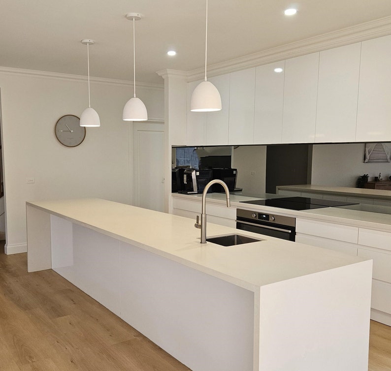 Naaya Dome white clay ceramic pendant light single over white kitchen island dining room contemporary home handmade plug in hardwired Naaya