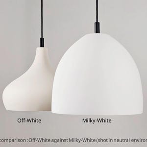 May include: Two white pendant lights with black cords and fixtures. One is a teardrop shape, the other a rounded dome. Text reads "Off-White" and "Milky-White" for shade comparison.