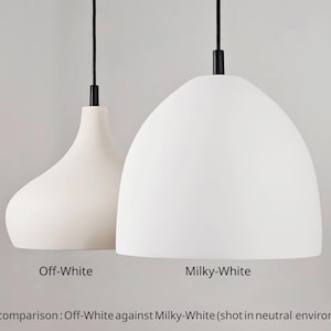 May include: Two white pendant lights with black cords and fixtures. One is a teardrop shape, the other a rounded dome. Text reads "Off-White" and "Milky-White" for shade comparison.