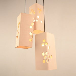 Ceramic Pendant lights, pattern cut lighting Naaya BEEHIVE Skylight for dining areas, bars, restaurants table lighting, ambiance lights