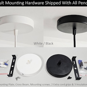 May include: A set of ceiling mounting hardware for pendant lights, featuring white and black circular canopy plates, cross beams, mounting screws, two extra cord grips, and three insulation caps, with text stating 5" Mounting Plate.