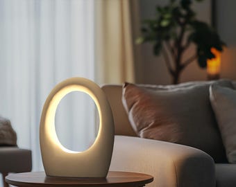 Ceramic Table Lamp with Sculptural Ring Glow, Contemporary Bedside Lighting – Naaya LIGHT BUCKET