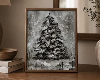 May include: A framed oil painting featuring a monochromatic gray and white depiction of a single evergreen tree. The artwork uses thick, visible brushstrokes to create texture, set within a simple, thin brown wooden frame on a flat surface.