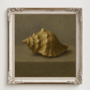 May include: A framed painting featuring a golden conch shell. The shell rests on a muted green surface, with a matching background. The ornate frame is white with a distressed finish, giving a vintage appearance.