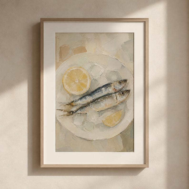 May include: A framed art print featuring a still life of two sardines on a white plate with lemon slices. The painting has a textured, impressionistic style with a neutral color palette, perfect for kitchen or dining room decor.