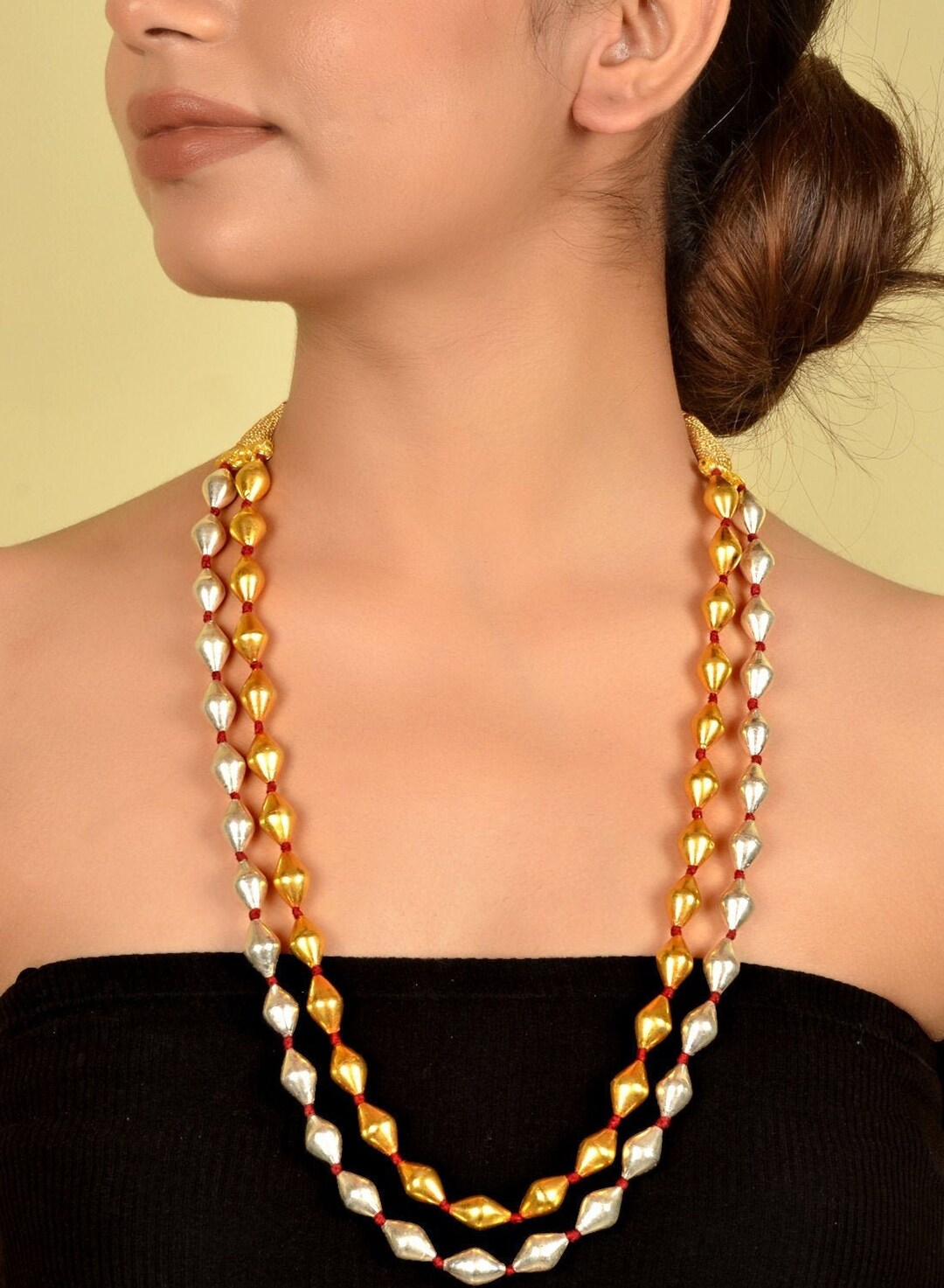 Gold dholki hotsell necklace