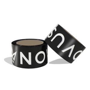 May include: Two rolls of black adhesive tape featuring bold white lettering. One roll is positioned upright, displaying the text NOVUS and a geometric crown icon, while the second roll is tilted, showing the letters OVUS in a clean, sans-serif font.