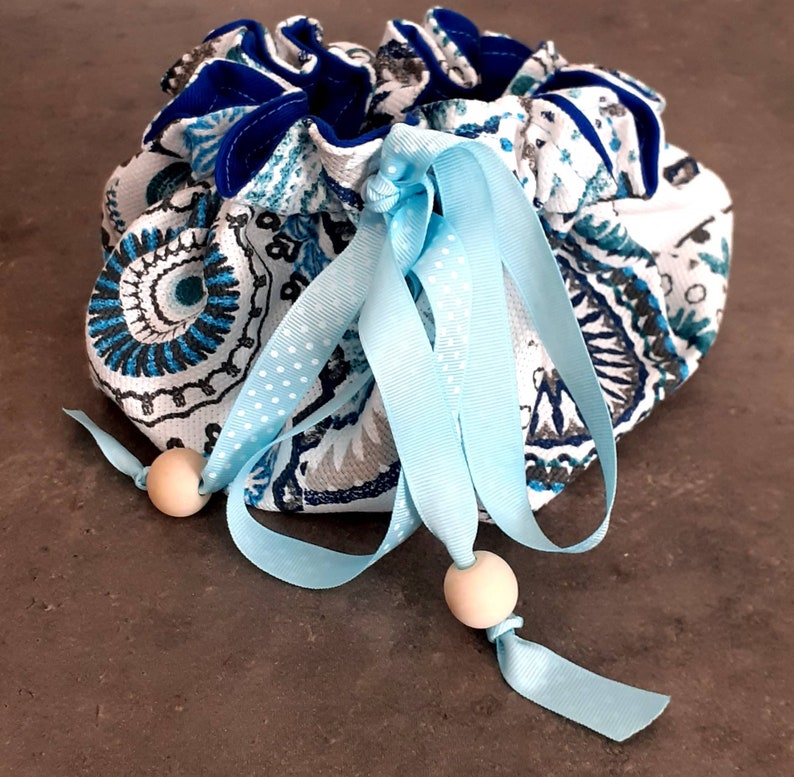 Large purse 45cm and its wipes in recycled textiles.