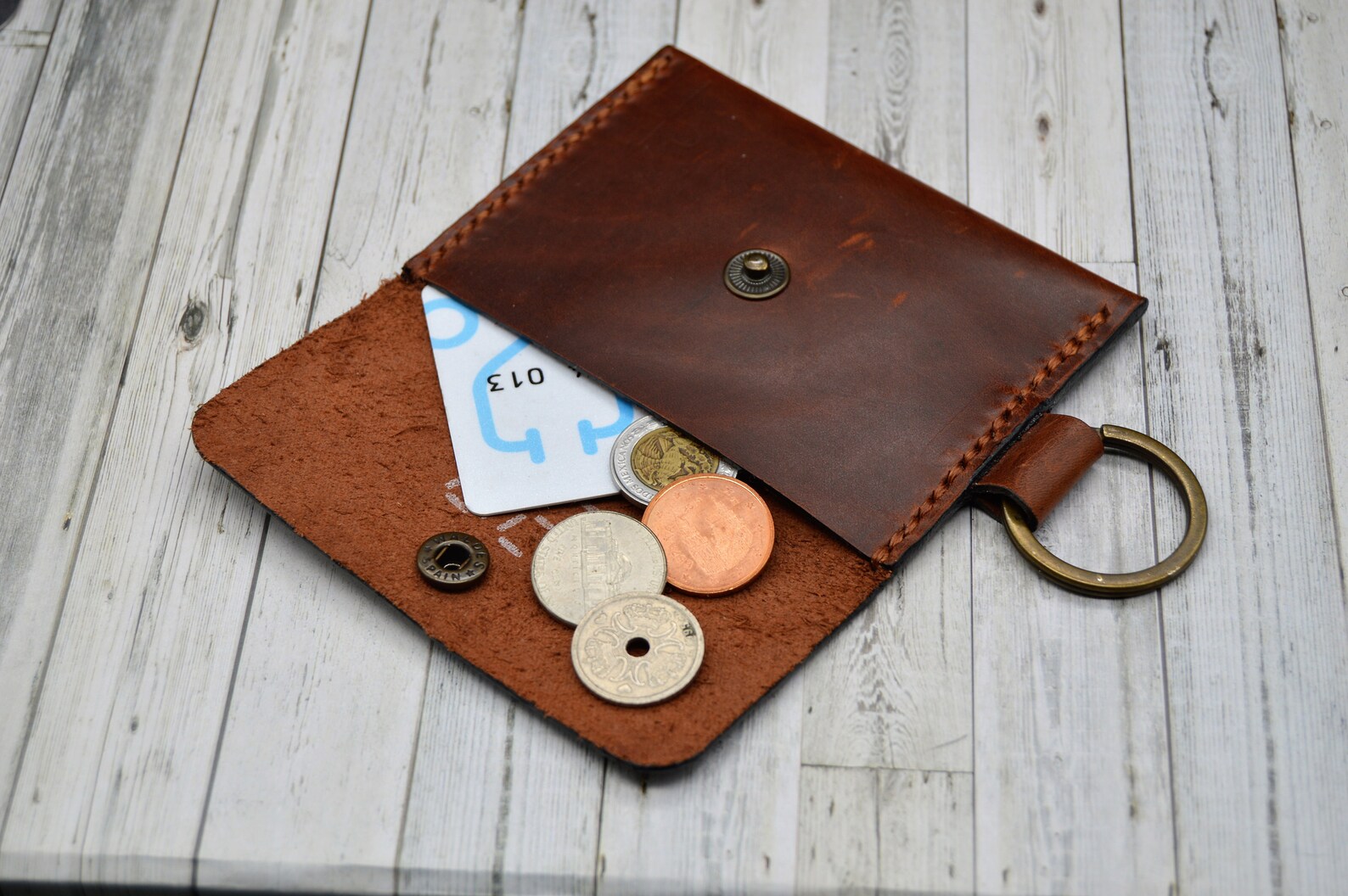 white keychain wallet