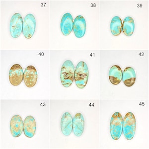 May include: A collection of oval-shaped turquoise gemstones, each paired, showcasing variations in color and matrix patterns. The stones range from solid turquoise to those with brown and tan inclusions, suitable for jewelry making.