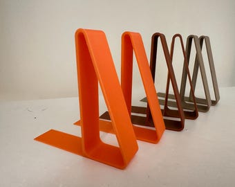 Bookend, Simple Design/Light Weight. Available in a range of colours. Set of 2
