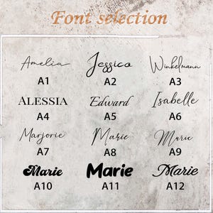 Peut inclure: Un tableau pr&eacute;sentant 12 styles de police diff&eacute;rents &eacute;tiquet&eacute;s de A1 &agrave; A12. Chaque style de police est affich&eacute; avec le mot "Amelia", "Jessica", "Winkelmann", "ALESSIA", "Edward", "Isabelle", "Marjorie", "Marie" ou "Marie" &eacute;crit dans le style de police.