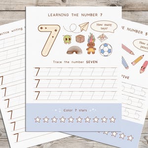 May include: A printable worksheet for learning the number 7. The worksheet includes practice writing the number 7, tracing the number 7, and counting 7 stars. The worksheet also includes a section for counting toys and pencils.