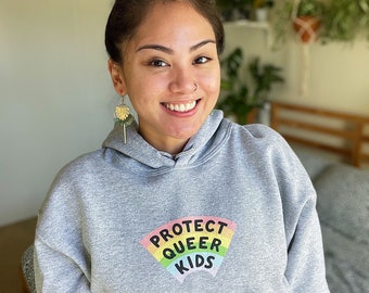 PROTECT QUEER KIDS Hoodie (30% of proceeds donated to Trans Justice Funding Project)