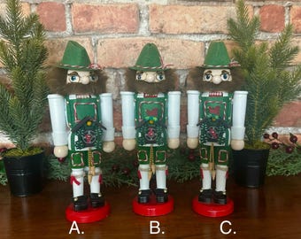 Handmade Mountain Climber/Volksmarcher nutcracker holding a wooden Chalet style cuckoo clock ornament! Unique Christmas gift. So cute!