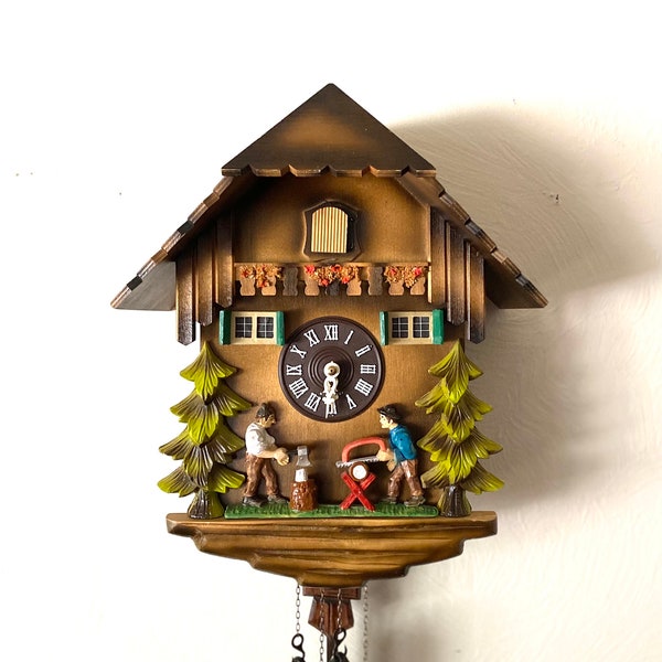 Working! 1982 Vintage “Lumberjack” chalet cuckoo clock. Moving characters! Made in West Germany. 1 year warranty included!