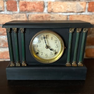 Antique, Sessions Adamantine Black Mantel clock, originally made in 1909! New quartz movement, works great! Absolutely classic!!