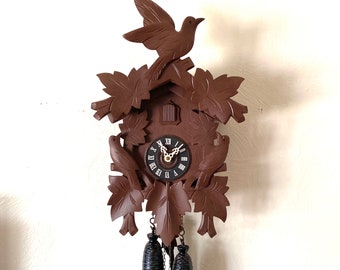 Vintage 1980’s LARGE, 8-Day “Leaf and Loon” style Cuckoo clock- hand carved in Germany. Works great!! 1year warranty included!!