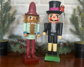 Set of 2 charming Vintage 1970’s nutcrackers. Unbranded. So nostalgic! Beautiful Christmas decorations or gifts!!