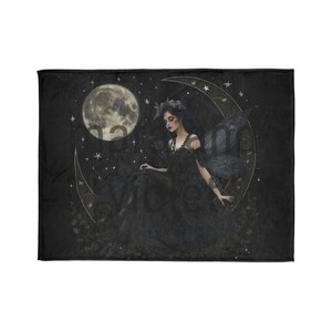 May include: A dark fairy with wings sits on a crescent moon with a full moon in the background. The fairy is wearing a black dress and has a floral crown on her head. The background is a dark blue with stars.