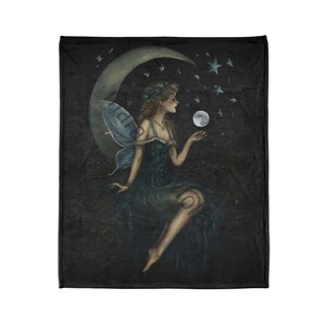 May include: A fairy with blue wings sits on a crescent moon, holding a small moon in her hand. The background is a dark blue with stars.