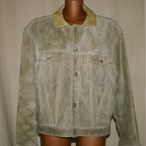 May include: A light brown suede jacket with a button-up front and a corduroy collar.