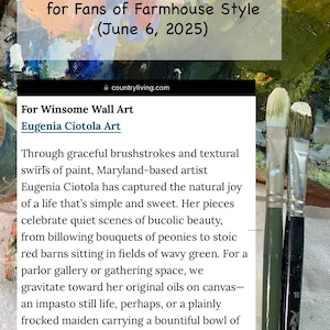 May include: A digital screenshot of a Country Living article featuring Eugenia Ciotola Art, overlaid on a wooden palette with colorful oil paint smears and two paintbrushes with white bristles resting on the right side of the frame.