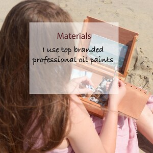 May include: A wooden portable art easel box containing professional oil paint tubes and a palette knife, with a small landscape painting displayed on the easel. The text overlay reads: Materials, I use top branded professional oil paints.