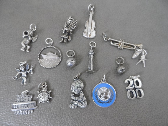 Choice Vintage Charms, Sterling Silver Charm,Bag Pipes, Violin, Ballerina, Silver Springs, Precious Moments, UN Flag, Trumpet, Space needle