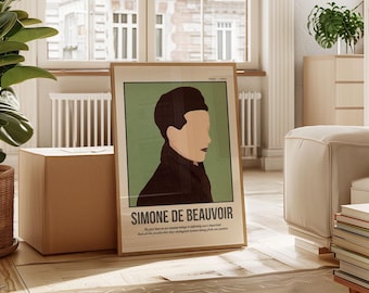 May include: A framed poster with a green background and a black and white illustration of Simone de Beauvoir. The text on the poster reads "Simone de Beauvoir" and "The fact that we are human beings is infinitely more important than all the peculiarities that distinguish human beings from one another."