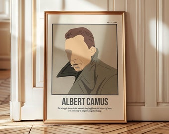 May include: A framed art print featuring a stylized portrait of Albert Camus. The print has a gold frame and includes the text "ALBERT CAMUS" and a quote. The color palette includes beige, brown, and olive green.