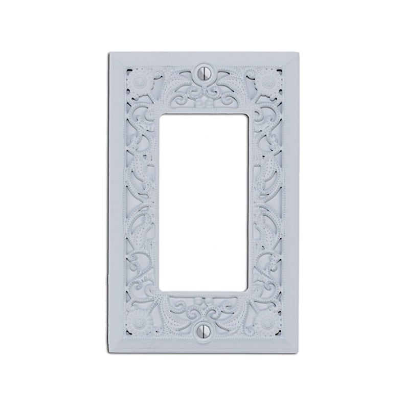 May include: White decorative wall plate with a single switch opening and an intricate floral design.