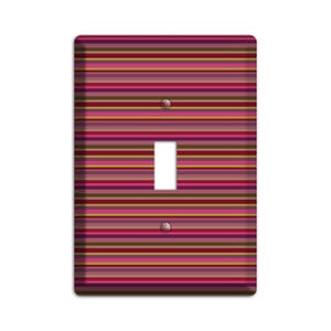 May include: A light switch cover with a colorful striped pattern in shades of pink, purple, brown, and yellow.