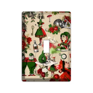 May include: A light switch cover featuring a whimsical Alice in Wonderland themed design. The cover is decorated with a variety of characters and objects from the story, including Alice, the Mad Hatter, the Cheshire Cat, and a playing card. The background is a cream color with red roses and green leaves.