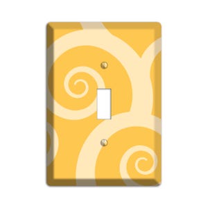 May include: A yellow light switch cover with a white swirl pattern.