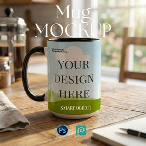 May include: A white ceramic mug with a black handle and interior, featuring the text "YOUR DESIGN HERE" on a light blue background with a cloud and green accents. The word "Mug MOCKUP" is at the top. Includes Photoshop and Procreate icons.