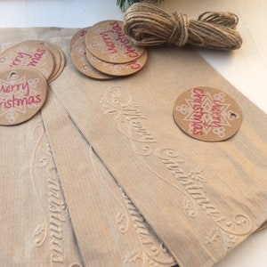 Un sacco di 10 bustine Natural Kratf Papers messaggio "Merry Christamas" per regali a sorpresa, biglietti di Natale, banconote.