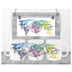 May include: Three white ceramic mugs with a watercolour design of a compass and a world map. The mugs feature the text "Not all who wander are lost".