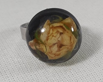 Unique Epoxy Resin Ring with Dried Dwarf Rose in a Black Background