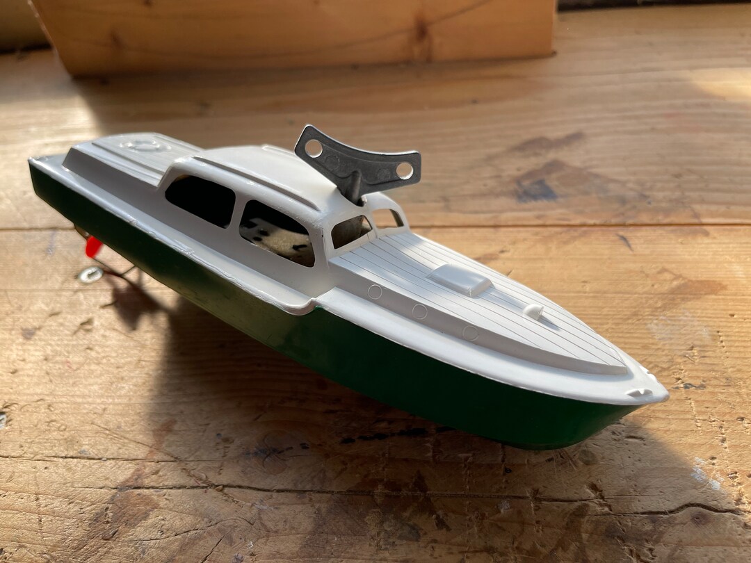 A Working Triang 9 Inch Speedboat Clockwork Boat a Wind up Toy Boat