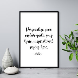 May include: A black framed print with a white background and black text that reads "Personalise your custom quote, song lyric, inspirational saying here. - Author"