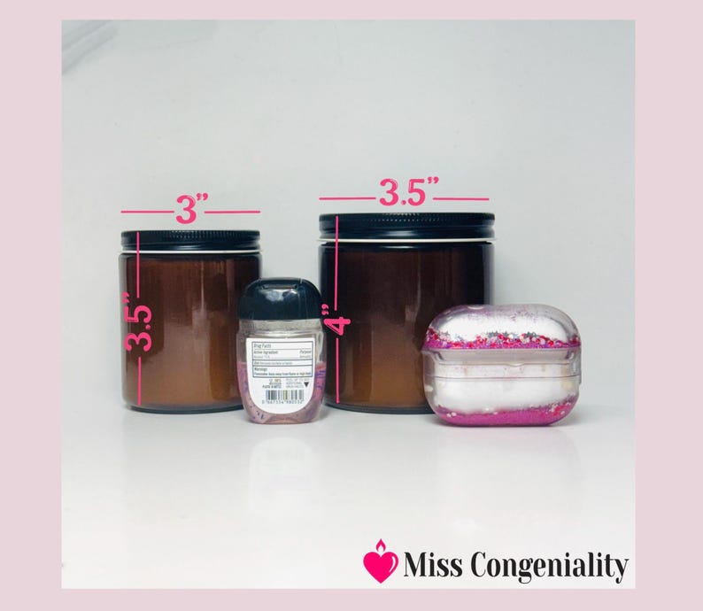 May include: Three glass jars with black lids. The jars are 3.5 inches tall and 3 inches wide. A small clear plastic bottle with a black lid is in front of the jars. The bottle is 4 inches tall. A pink and white glitter case is in front of the jars. The case is 3.5 inches wide. The text "Miss Congeniality" is in the bottom right corner of the image.