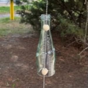 Handmade San Pellegrino puzzling wind chime.